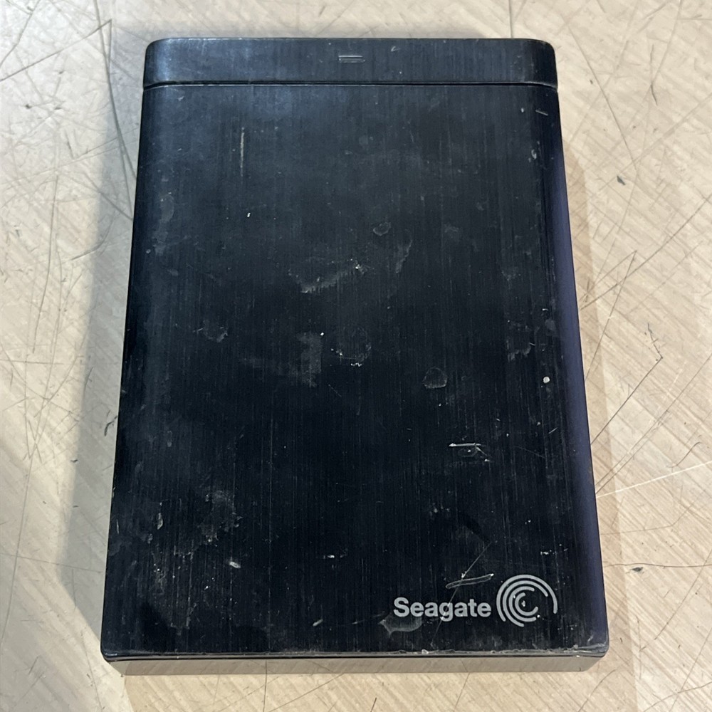 SEAGATE BACKUP PLUS PORTABLE EXTERNAL HARD DRIVE MODEL SRD0SP0 1.5TB