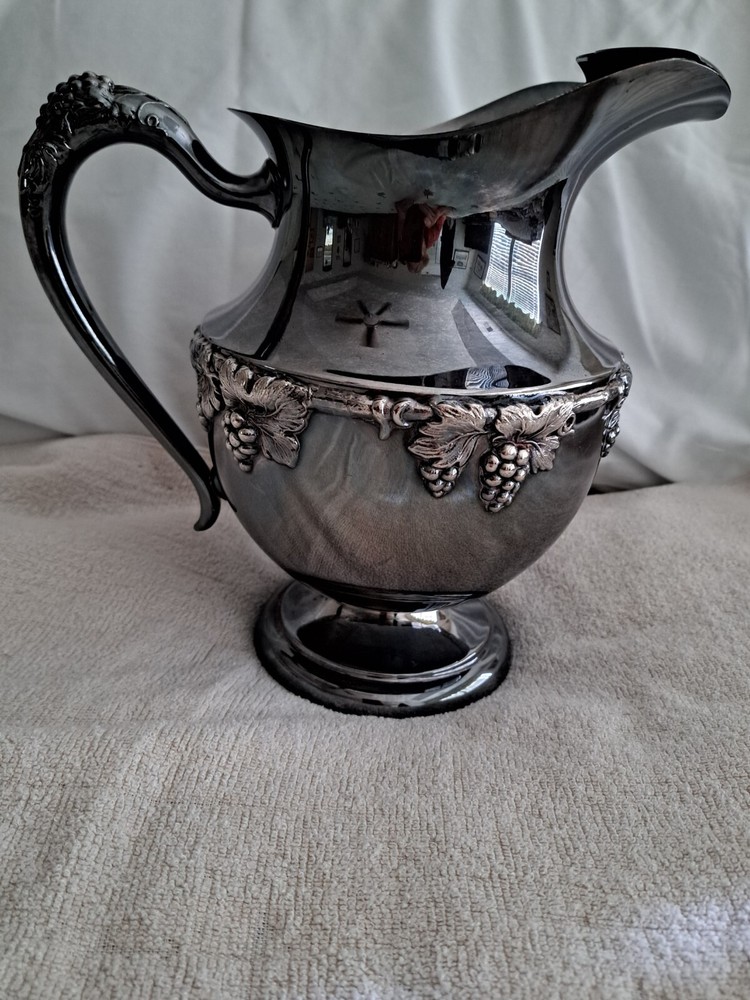 silver embossed grapes and leaf water pitcher