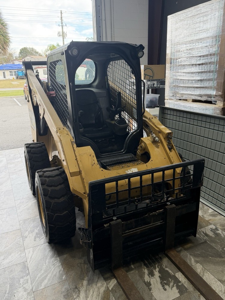 Cat Skid Steer With Attachments