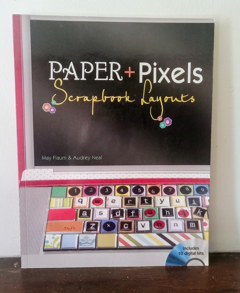 two scrapbooking instructional/layout books. one has program CD included.