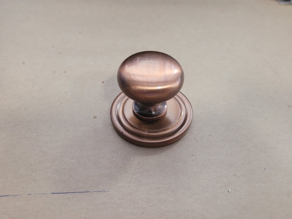 Colonial Bronze Antique Copper Round Knob With Backplate.