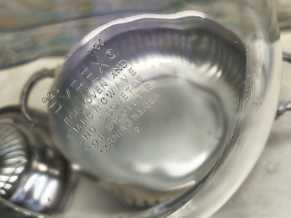 Silverplate round foote casserole dish with original Pyrex liner