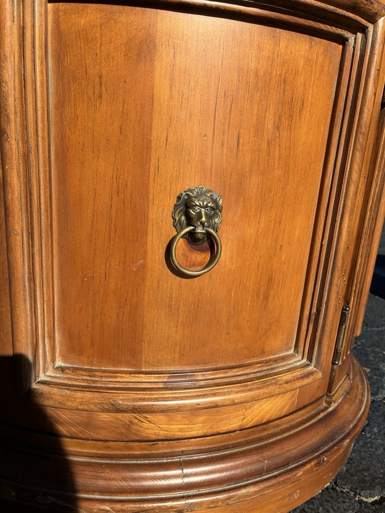 This Ethan Allen Tuscan Oval Cabinet Drum Table