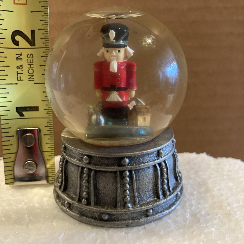 Mini Nutcracker Snow Globe With Metal Base Height 2.5 inches