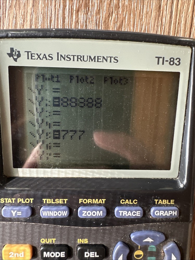 Texas Instruments TI-83 Graphing Calculator No Cover - Has Lines Going Through