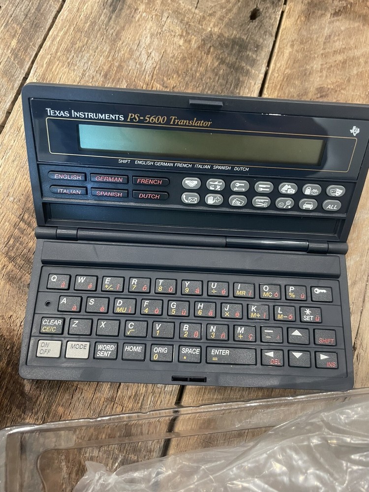 Texas Instruments PS 5600 digital pocket translator 90s. Works