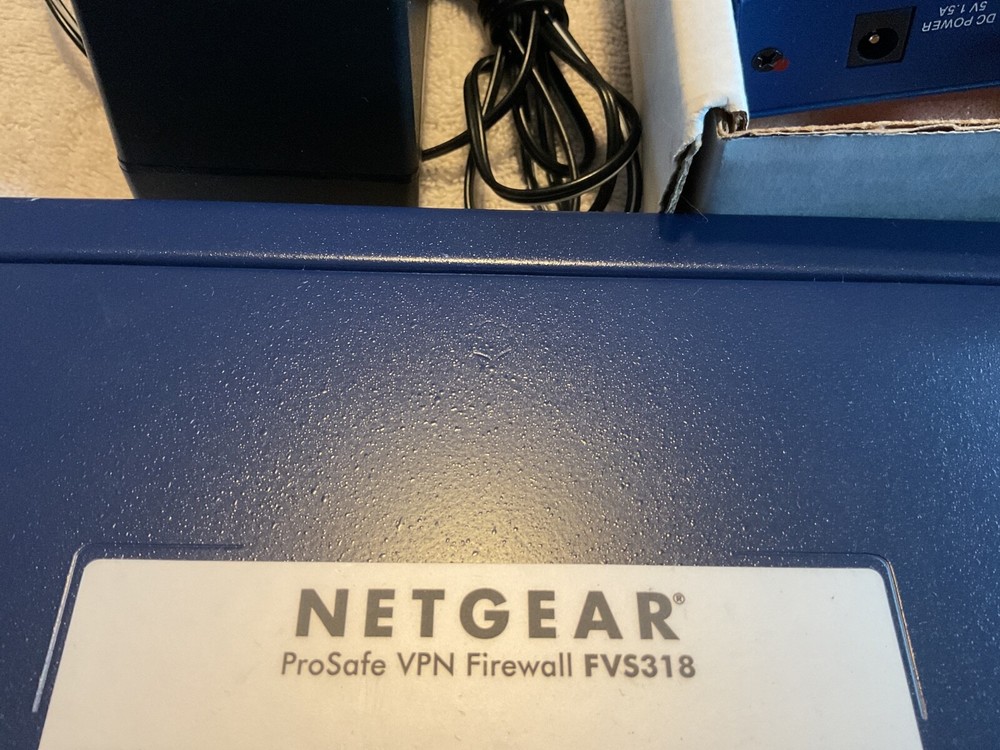 Misc. Older Routers Linksys, Netgear and Netscreen. 3 Total Routers