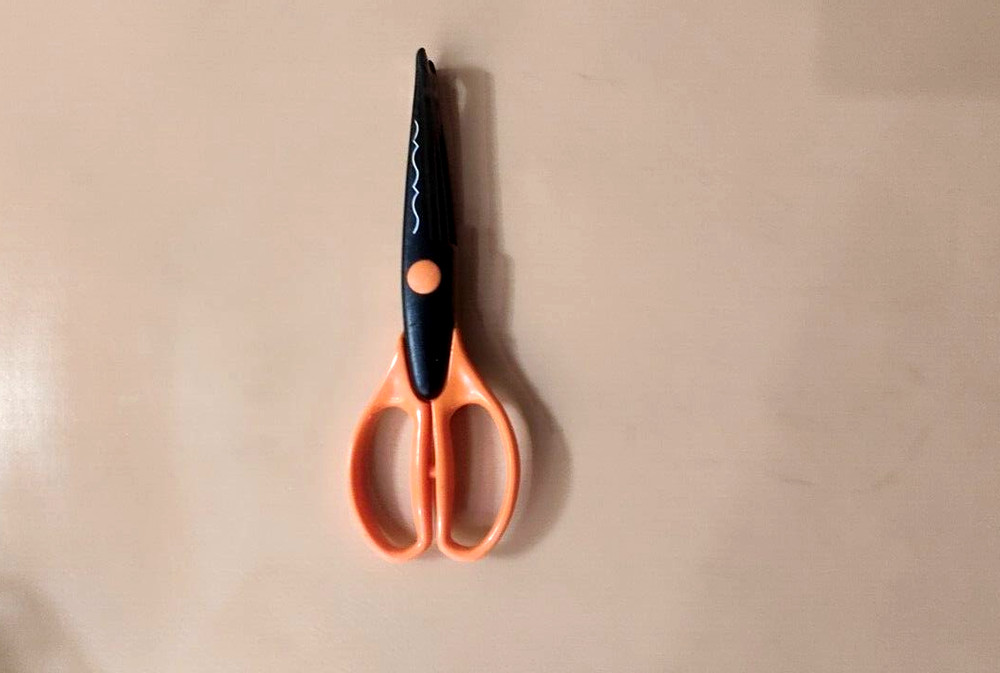 Scissors Wavy Cut Orange Handle   7” Long Pre-Owned