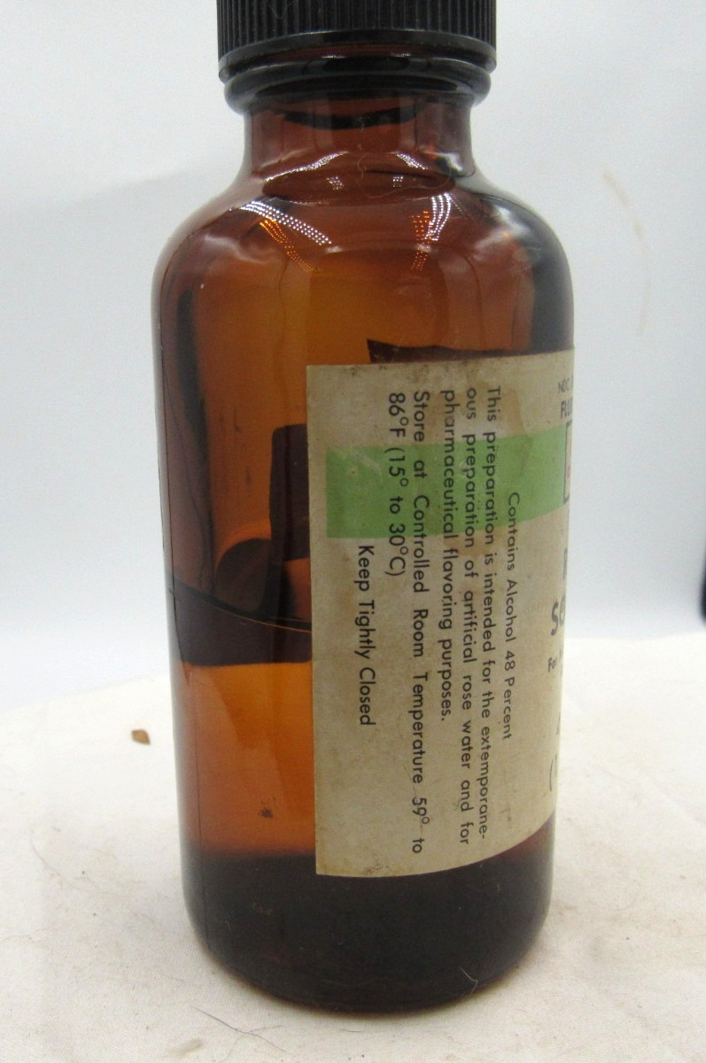 MM - 1980's Eli Lilly Rose Soluble Indianapolis Ind 4 7/8" Amber Medicine bottle