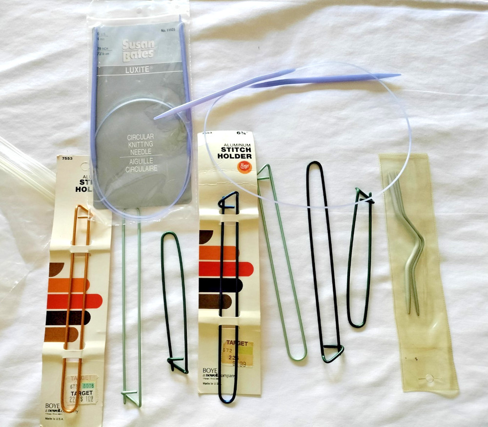 2 circluar knitting needles & 9 stitch holders