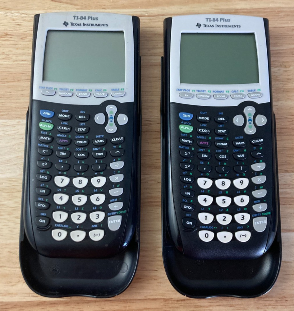 Two (2) Texas Instruments TI-84 Plus Graphing Calculators with Covers (Tested)