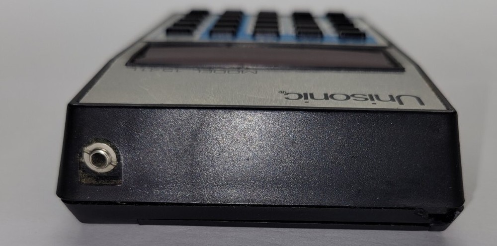 Unisonic Pocket Calculator Model 1541L Chipped Corner. UNTESTED