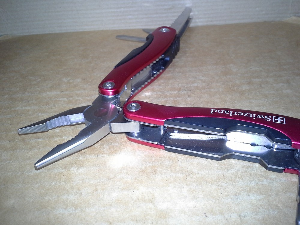 Switzerland Red Multitool Folding Pocket Pliers. VGC