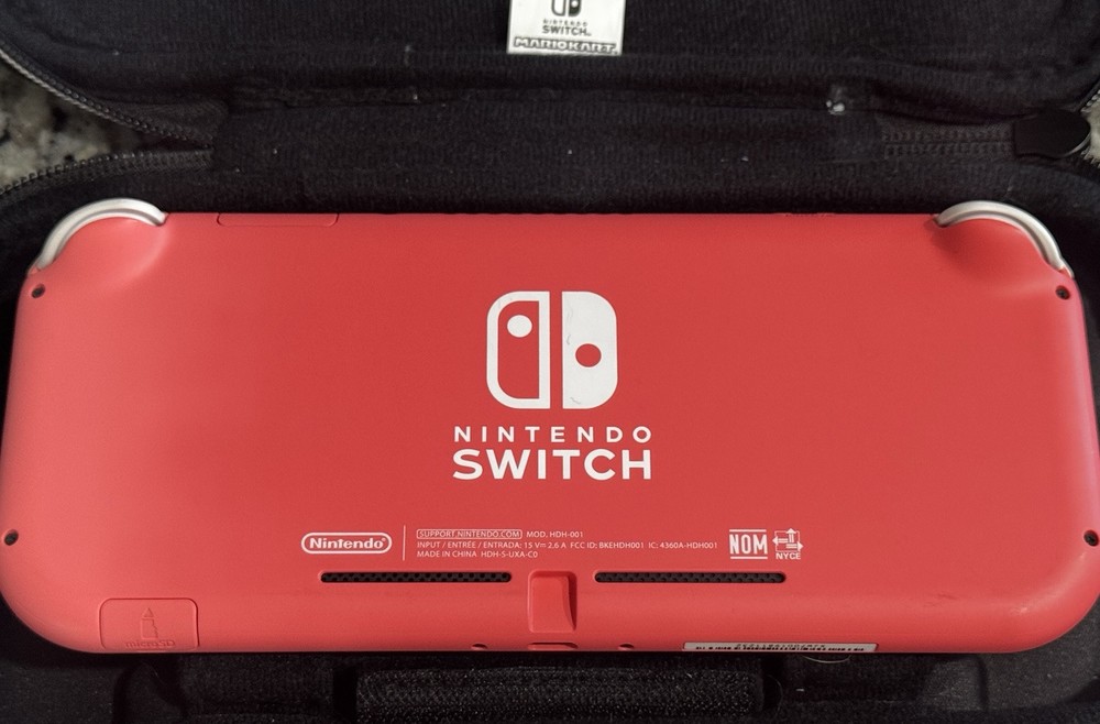 Nintendo Switch with games and controller