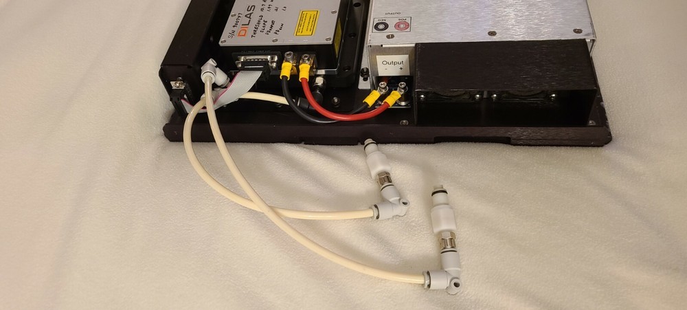 Coherent Laser Dilas with cooling block, interface unit and power supply.