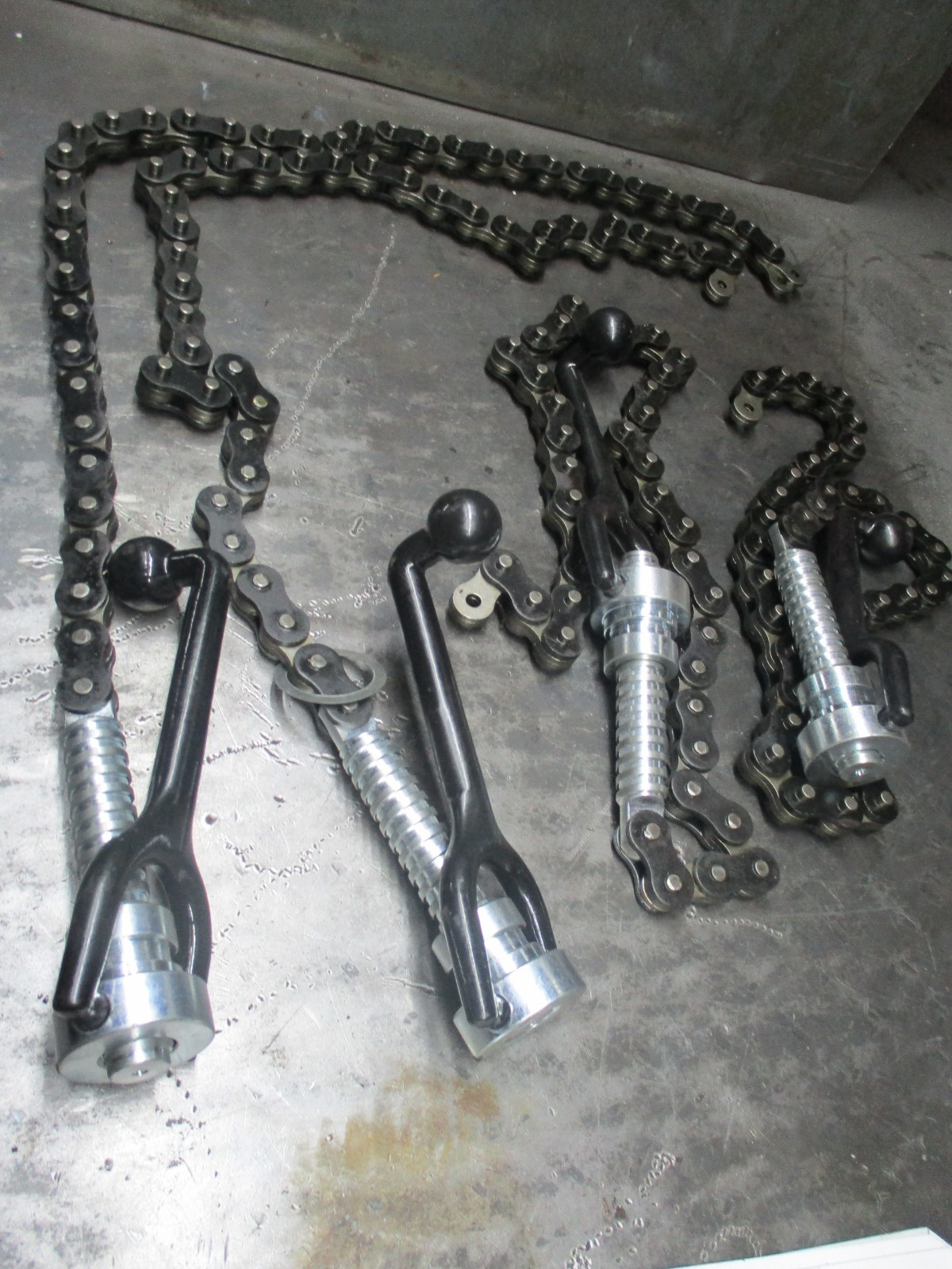 2 GREENLEE  TUGGER TIE DOWN CHAINS