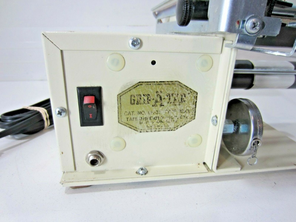 Grip-A-Tab Electric Tape Dispenser Machine
