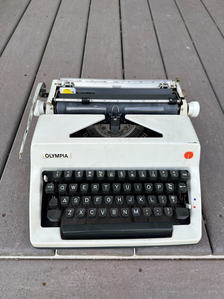 Olympia SM9 Portable Typewriter with case