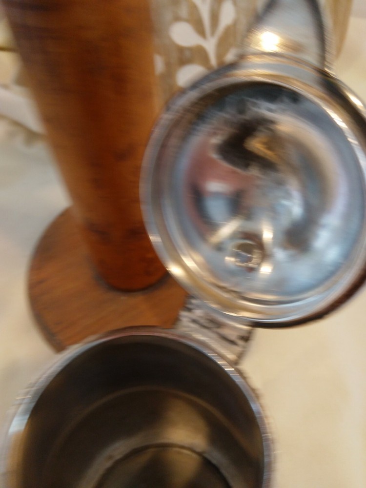 Beautiful small antique silver plated or silver pitcher.