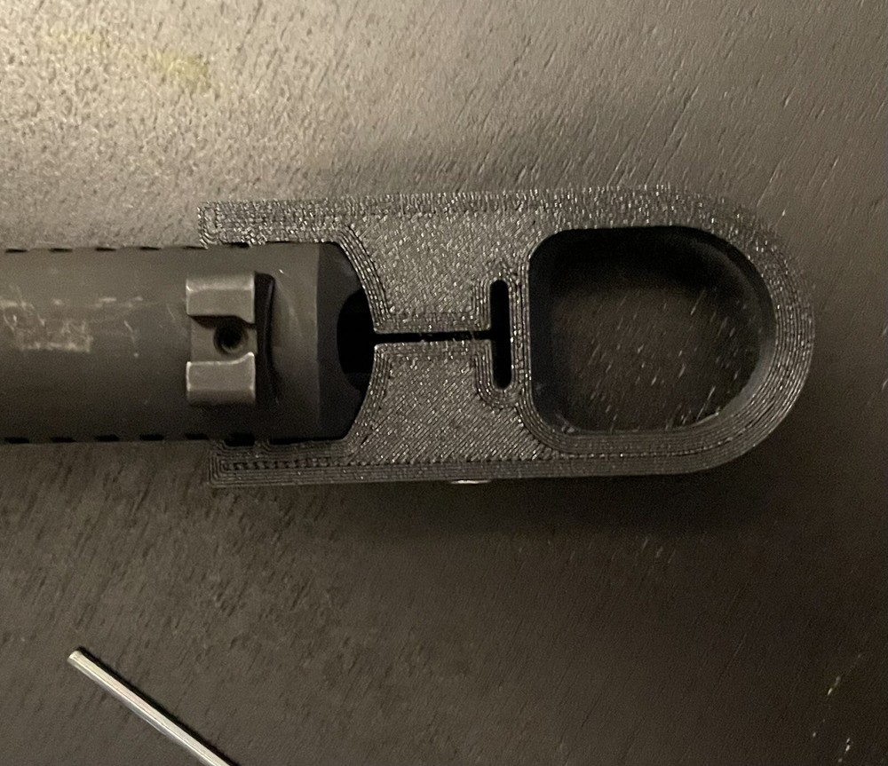 Colt Model 22 finger loop charger, slide racker.