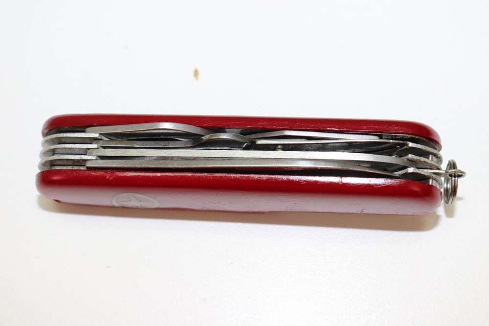 Rostfrei Pocket multitool red plastic handles gold mark E633