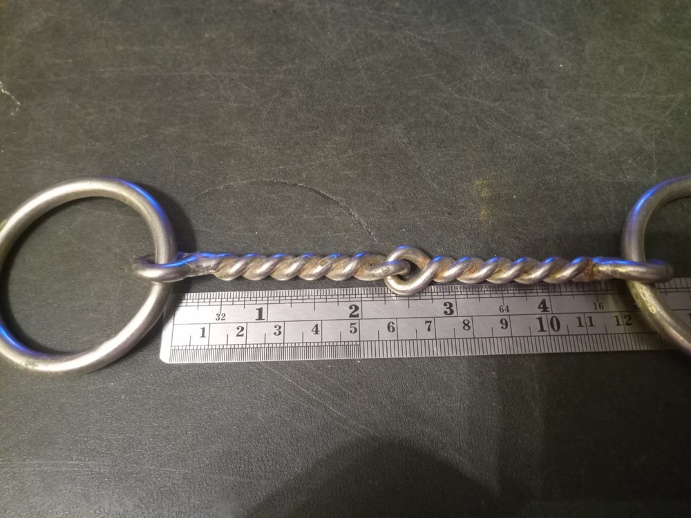 Used loose ring snaffle bit twisted wire mouth 4 3/4 in