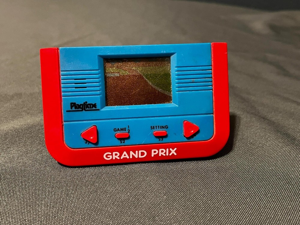 Playtime Grand Prix Handheld Electronic Console- LCD Screen 1980's- Working