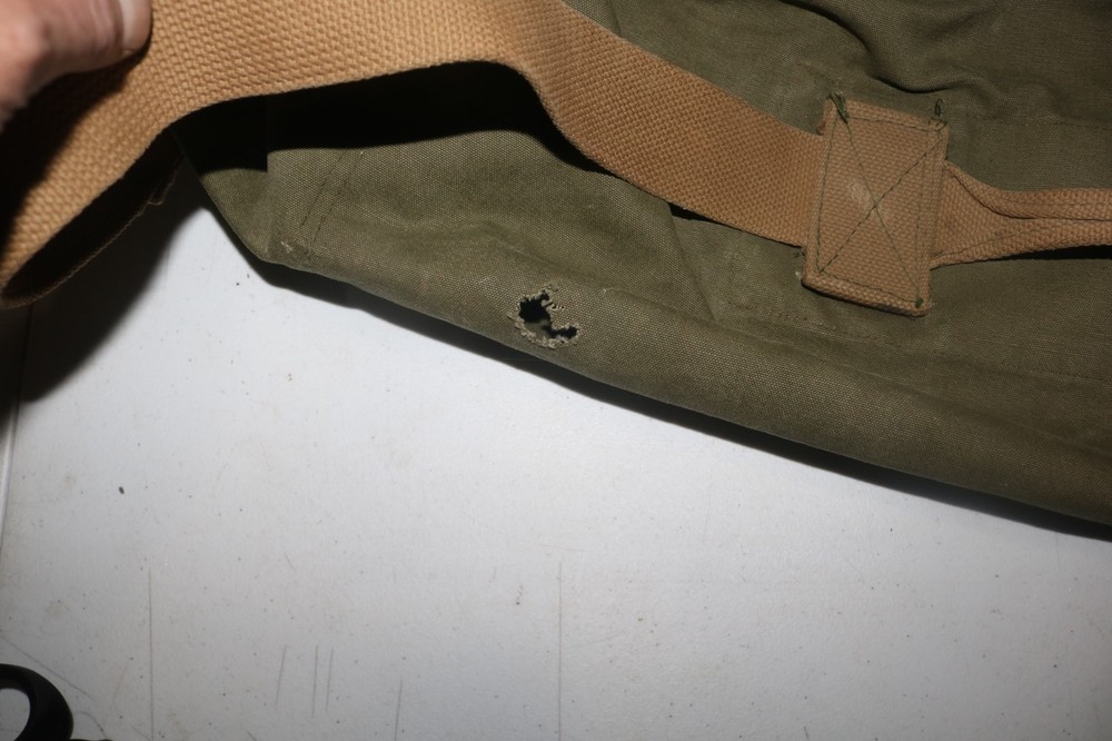 Original late WWII USMC marked transitional colored duffel bag named