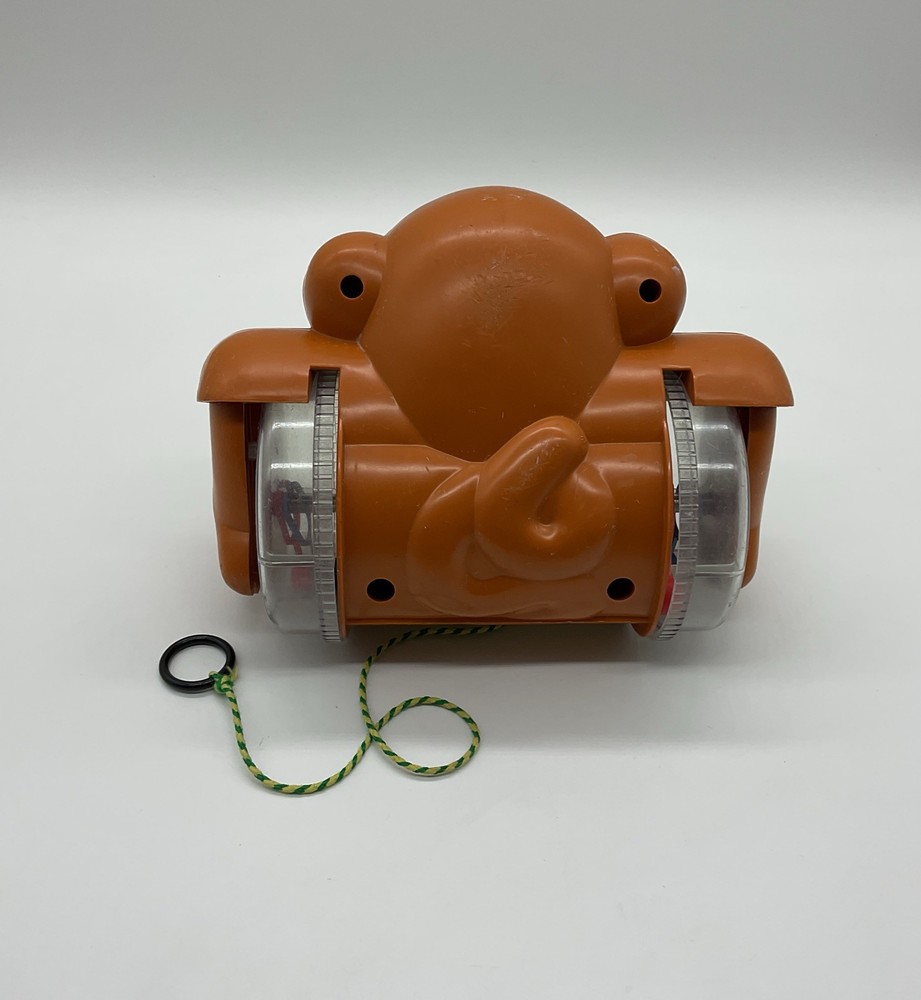 Vintage 1980s Pull Along Monkey Toy Rolling