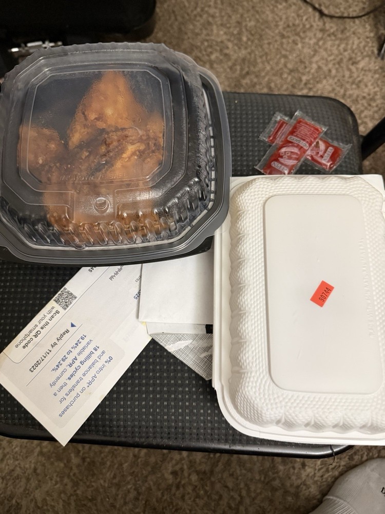 Cooked Meat Takeout in Containers with Condiment Packets
