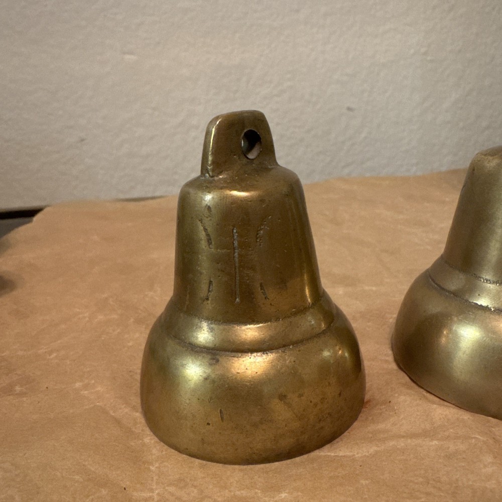 Vintage Brass bells with etchings x 2. Both missing clappers