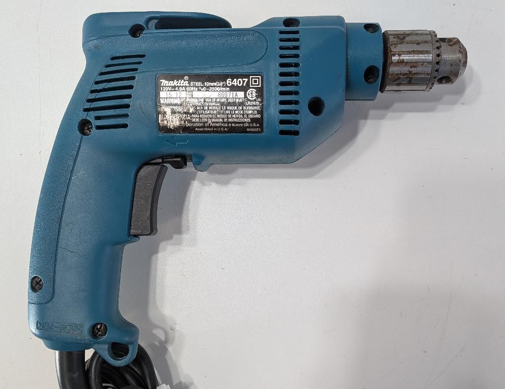 MAKITA 3/8" VARIABLE SPEED DRILL (P19016461)