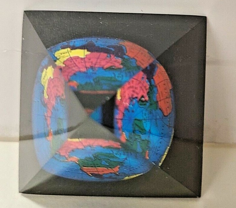 Globe inside Pyramid Paperweight
