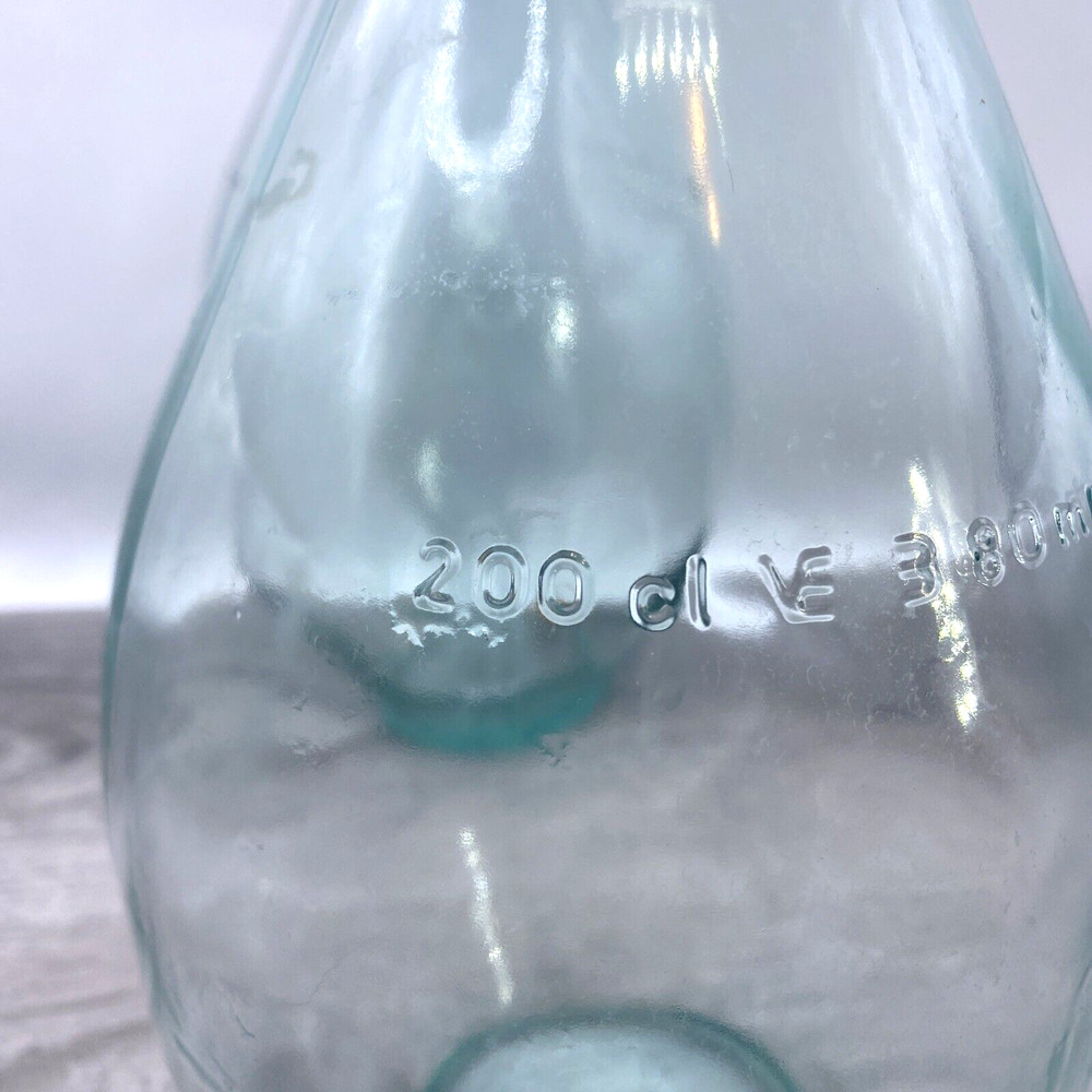 Two old wine bottles - 1 Cork inside - Label Residue