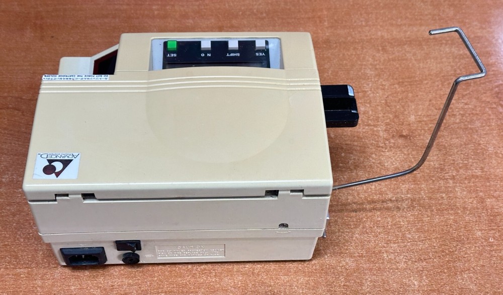 Noritsu Fara 300. APS Automatic Film Re-attach Unit