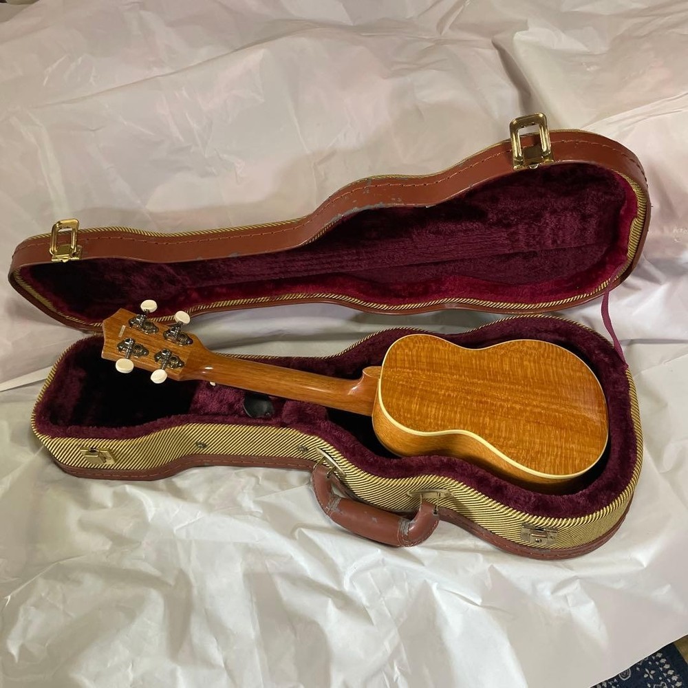 Soprano size ukulele and hard case