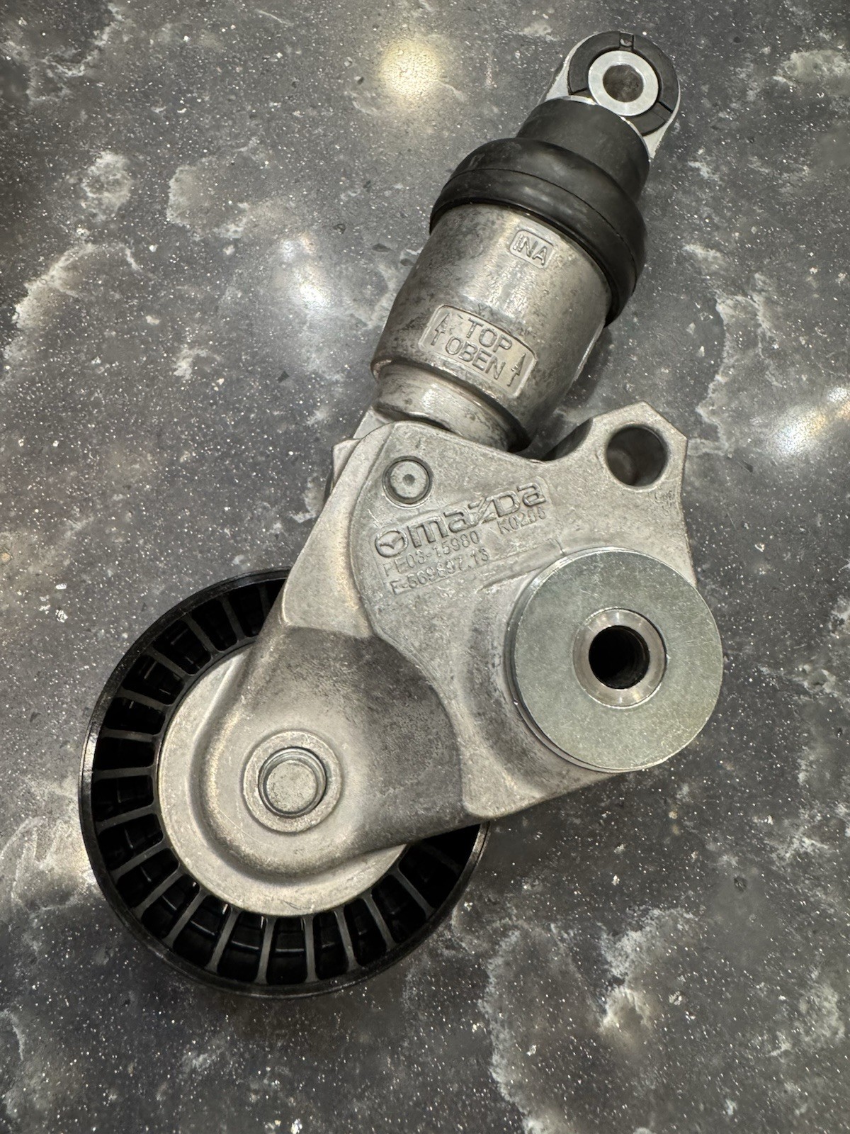 Genuine Mazda Tensioner PE03-15-980C