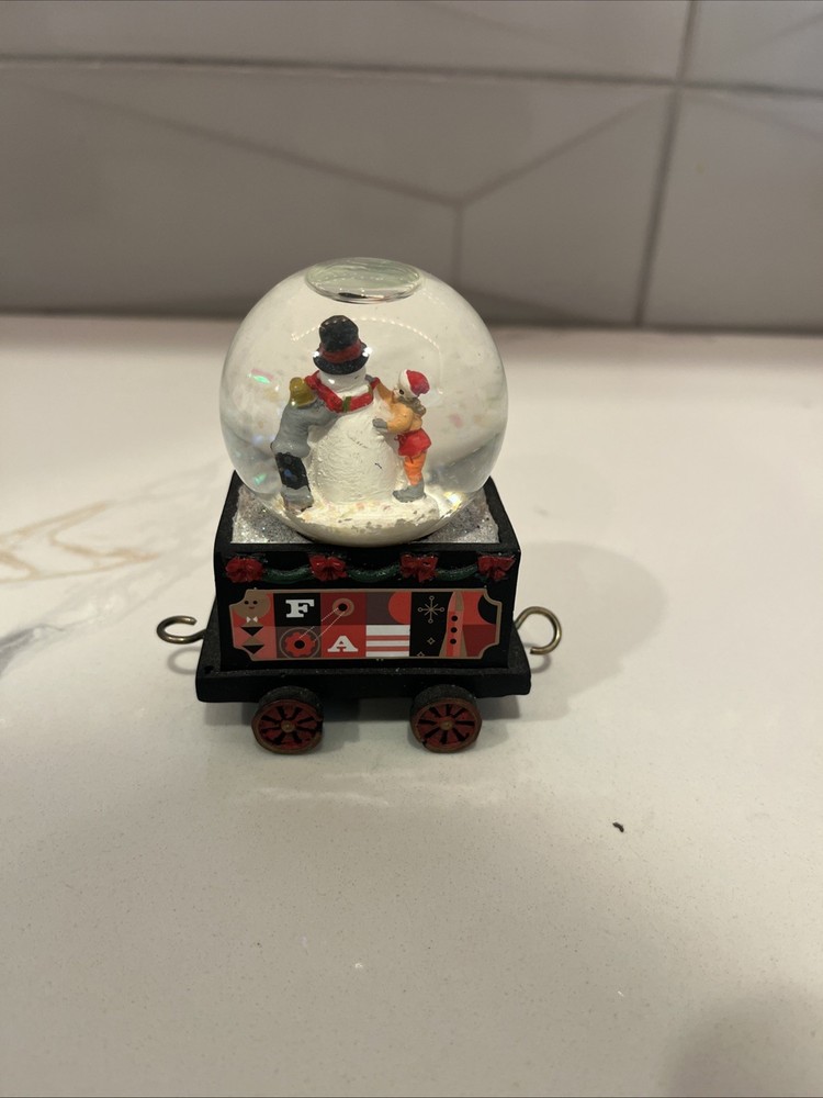 F.A.O SCHWARZ 4- piece Train Snow Globe Set
