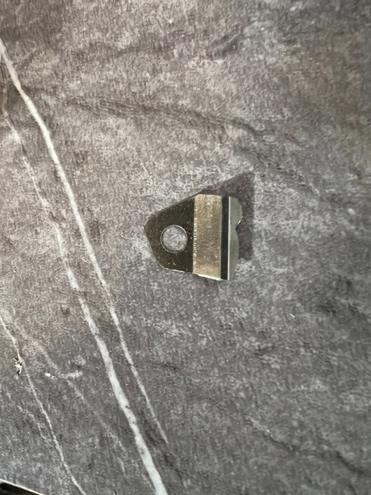 Under thread presser  #AT0210000000  for Tajima Emb. Machines