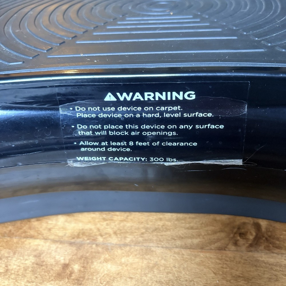 Black Vibration Plate Exercise Machine. Full-Body Vibrating Platform with Resist