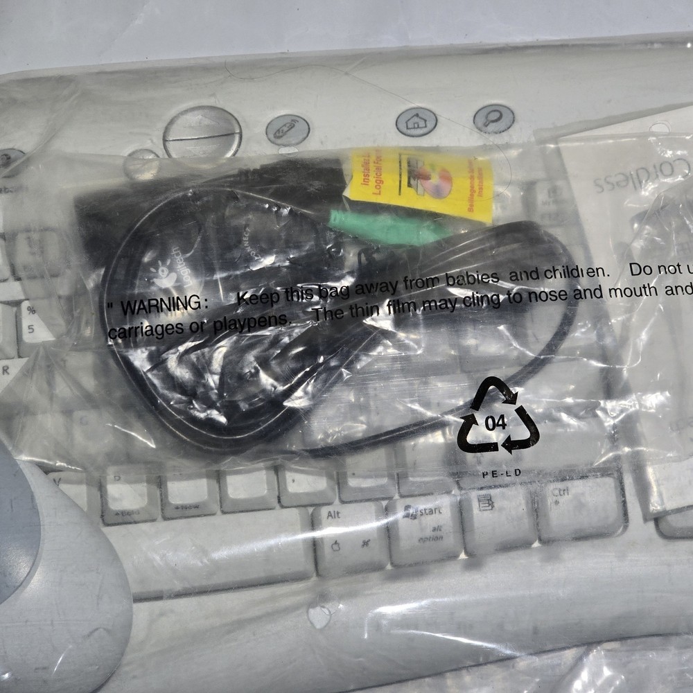 Logitech cordless Access Duo, keyboard and mouse.