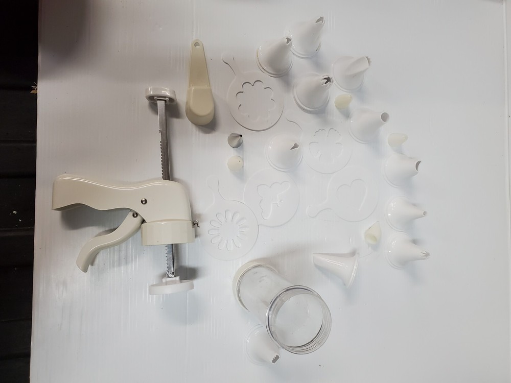 White plastic Cookie Press Disc Cutouts -with extras