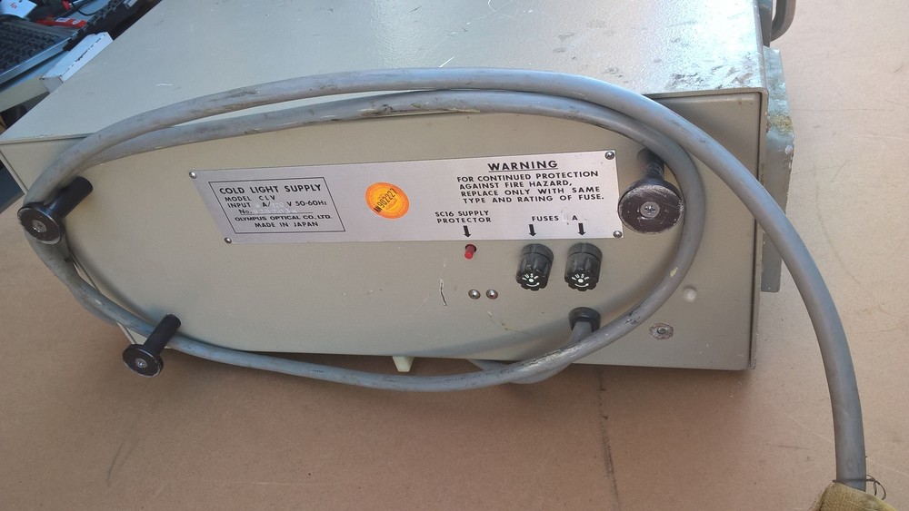 Olympus CLV Cold Light Source Supply with AC10-L adapter installed. original ver