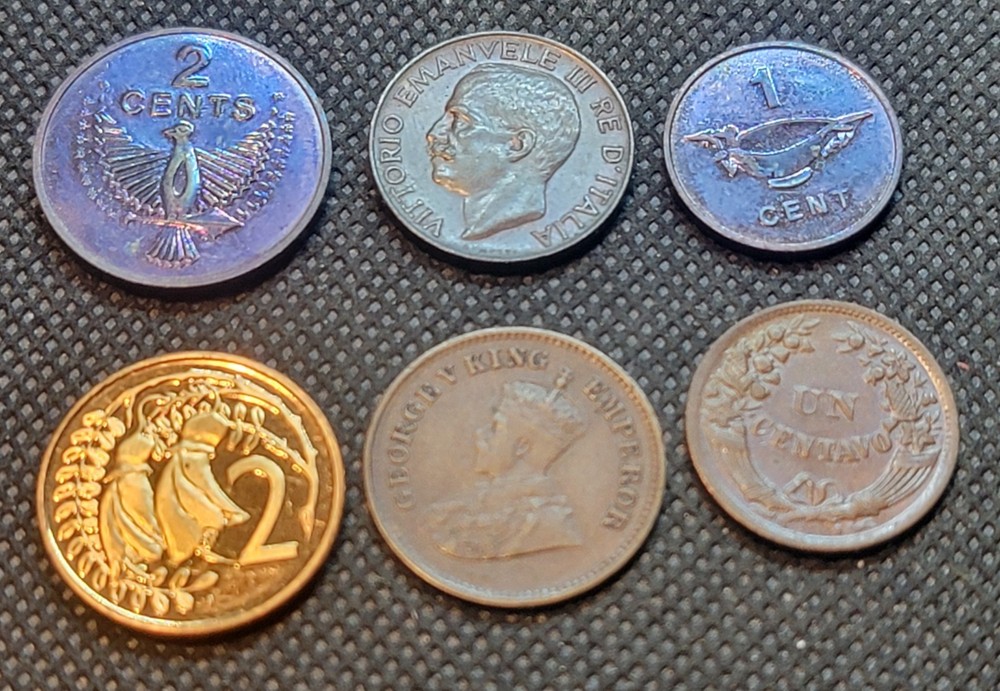 HIGH GRADE AND SOME TONED WORLD COINS  TA