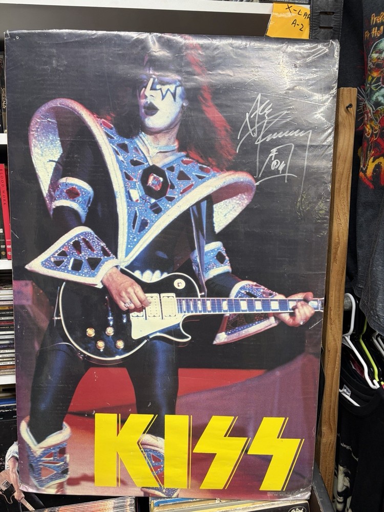 Ace Frehley Autographed Poster-24 X 36”