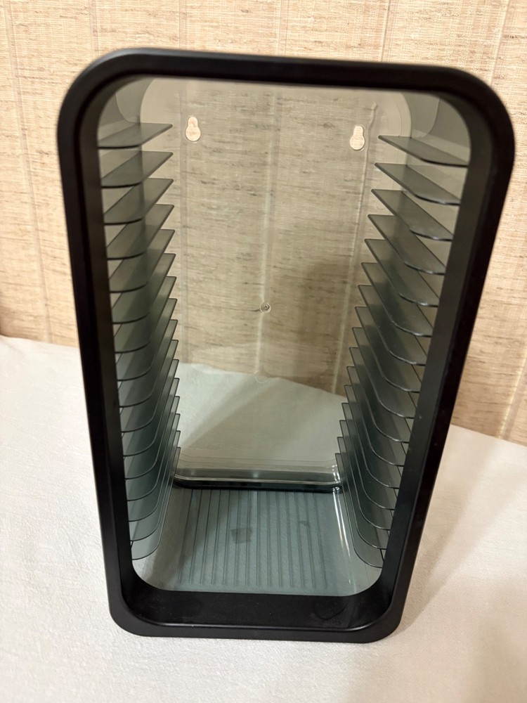 Plastic Disk Storage Shelf  With  7 Pre-Owned Plastic Disk Cases