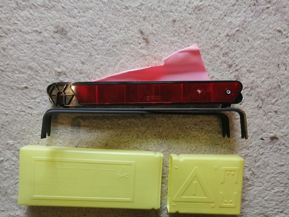 old warning triangle car jack