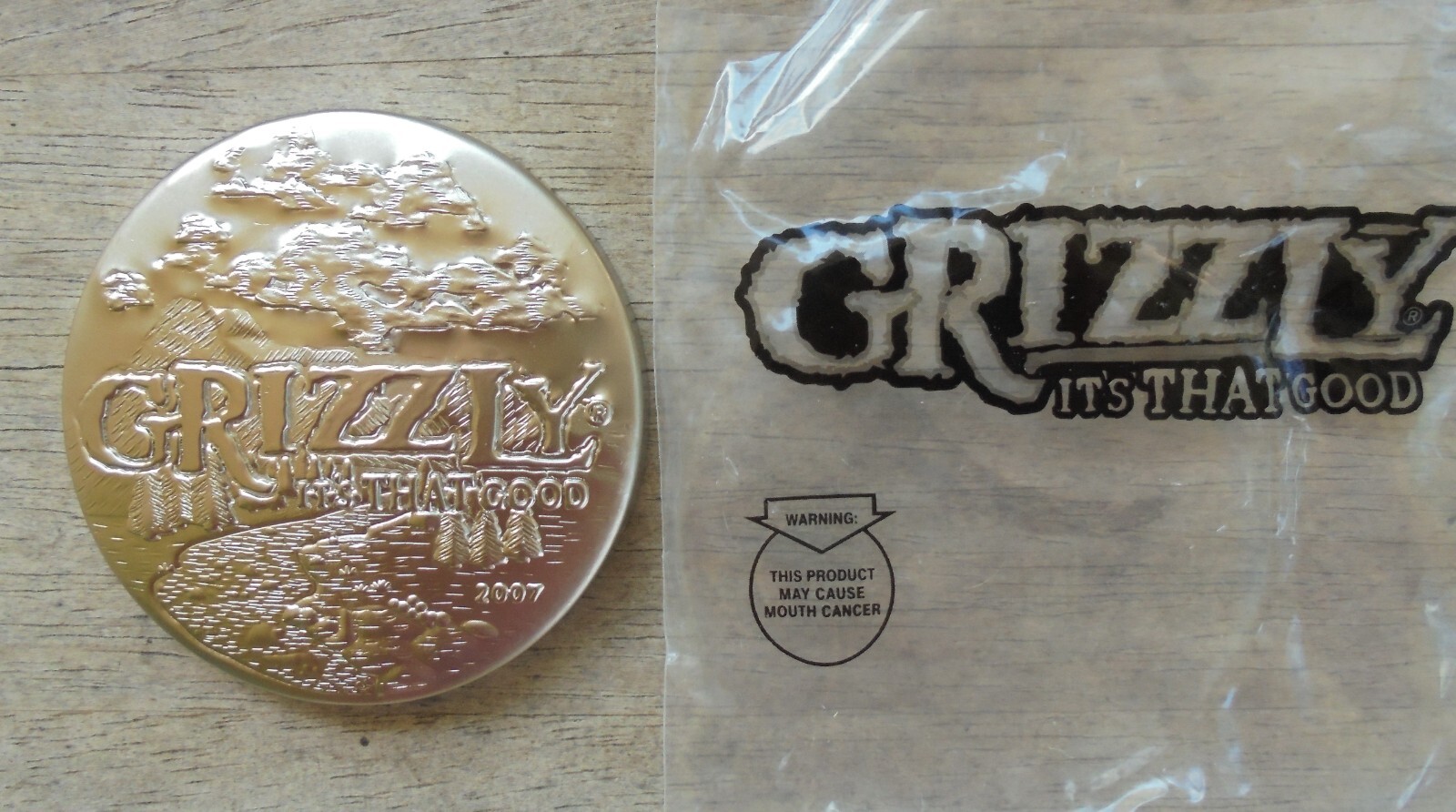 2007 Grizzly Premium Metal Snuff Can Lid "IT's THAT GOOD"-new/unused