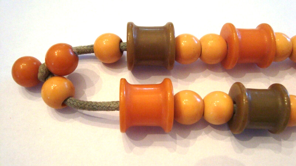 Vintage Bakelite Thread Spools and Bakelite Beads
