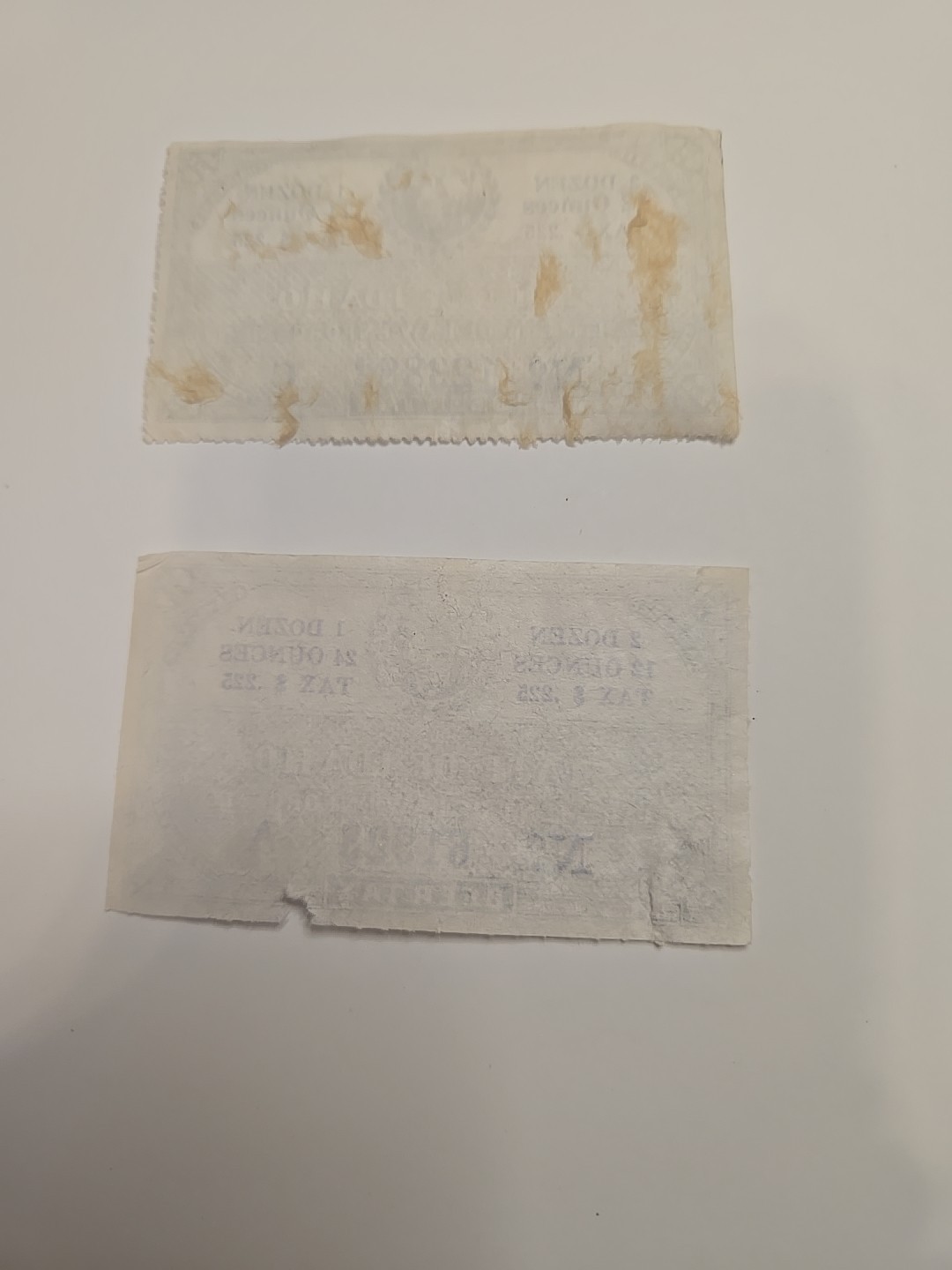 Back of book Lot . States Of Idaho Dept. Of Law Enforcement. Tax Stamps. (2)